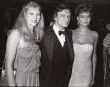 Hugh Hefner with Hope Olson and Carrie Leigh, 1983, LA.jpg